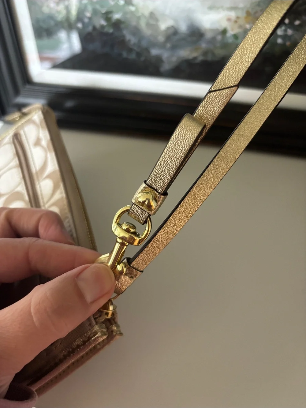 Coach Beige Signature Floral Wristlet with Gold Trim